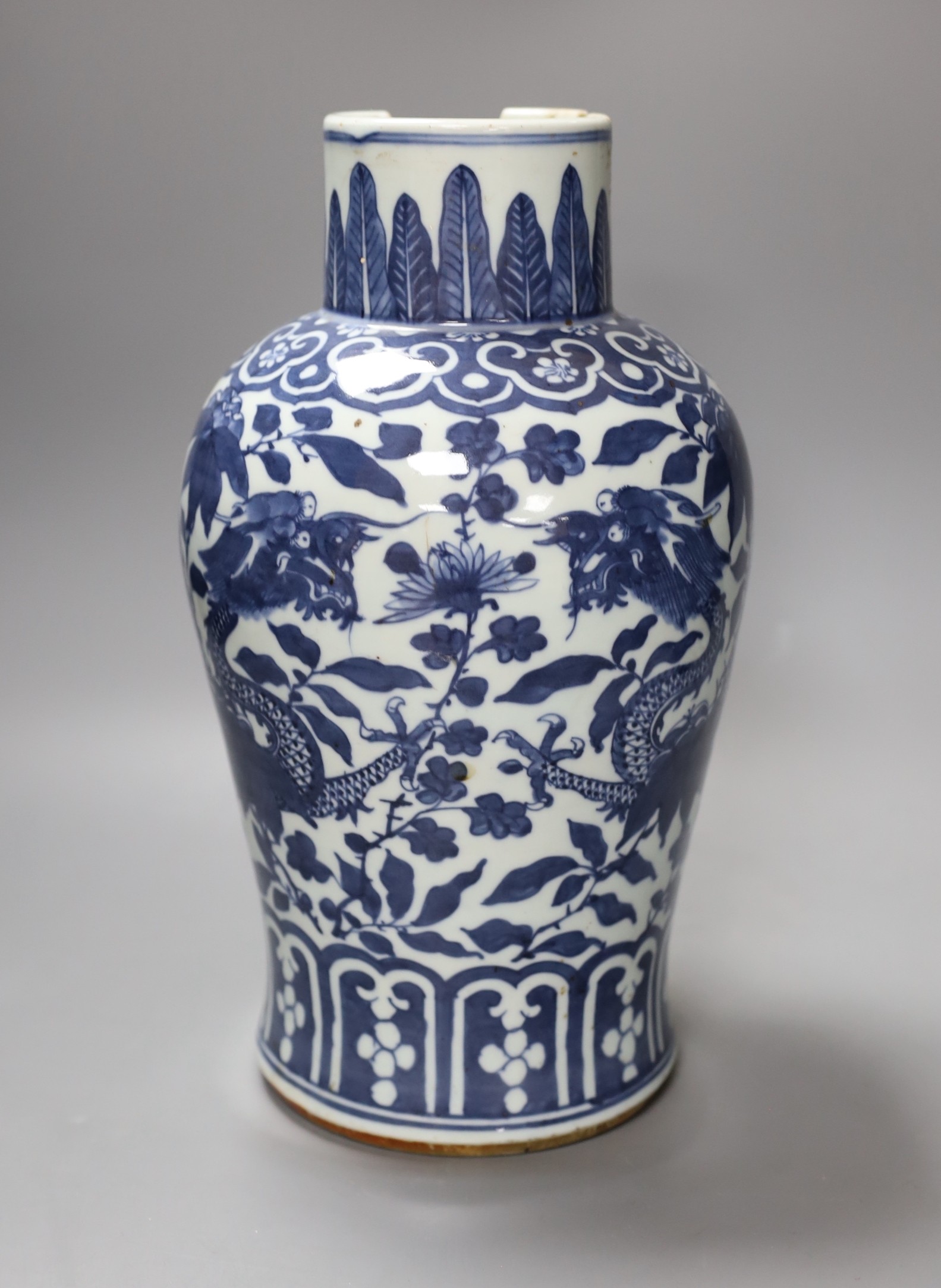 A 19th century Chinese blue and white ‘dragon’ jar, 33cm (a.f.)